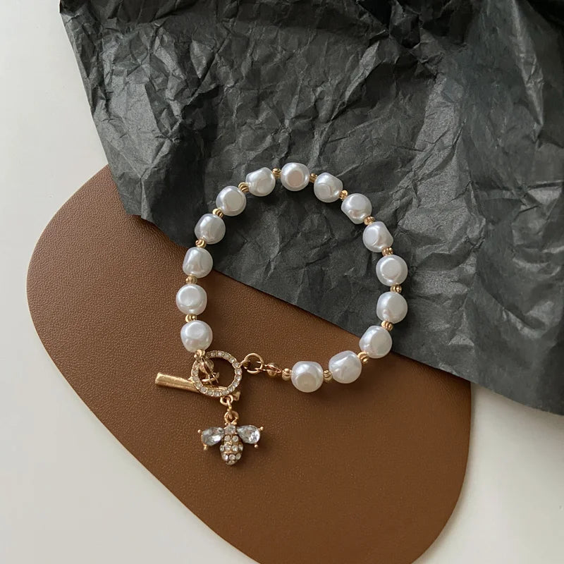 Lustrous Pearl & Diamond Charm Bracelet - GlamoROZ