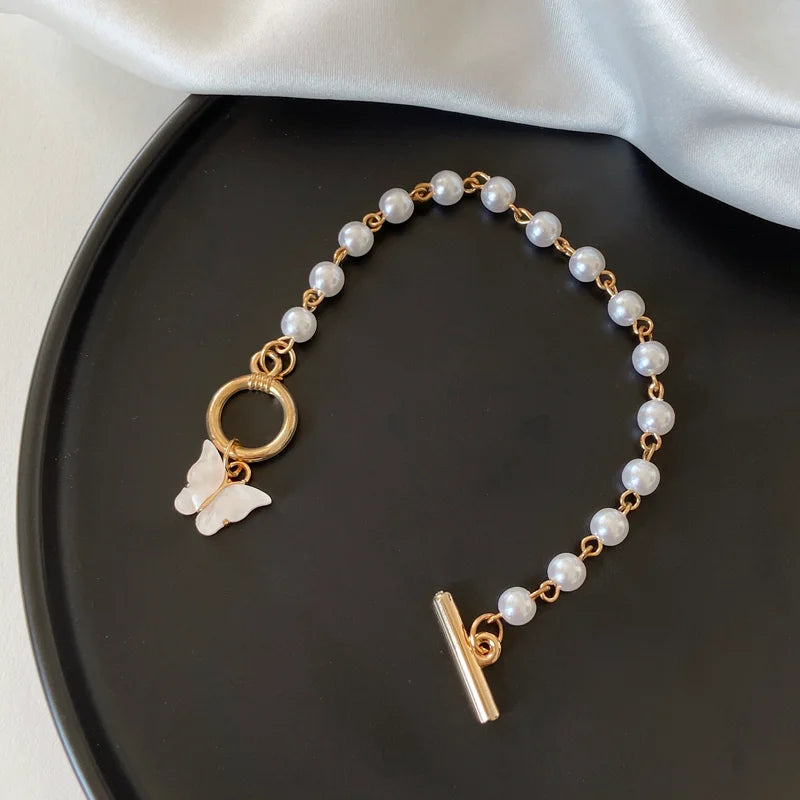 Opulent Pearl Butterfly Charm Bracelet - GlamoROZ