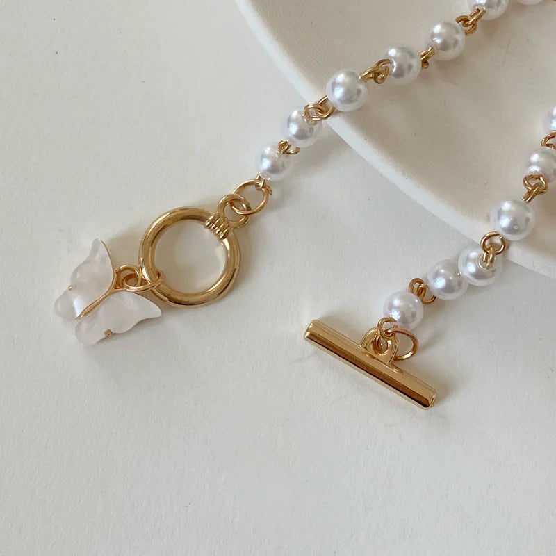 Opulent Pearl Butterfly Charm Bracelet - GlamoROZ