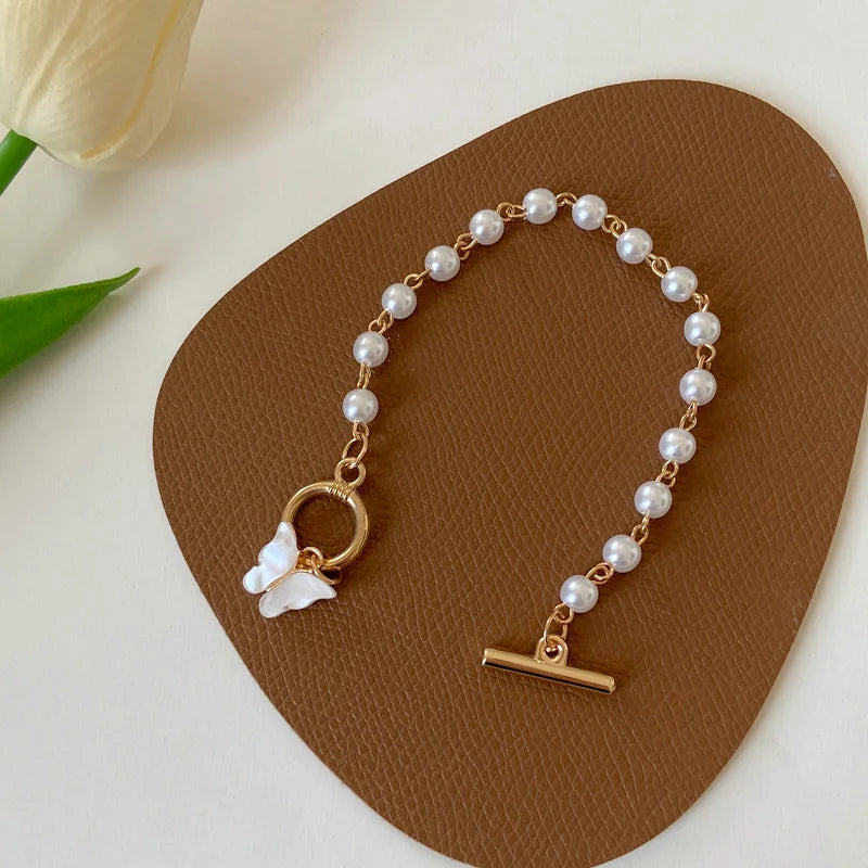 Opulent Pearl Butterfly Charm Bracelet - GlamoROZ
