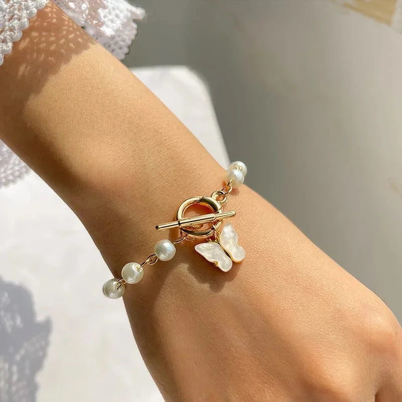 Opulent Pearl Butterfly Charm Bracelet - GlamoROZ