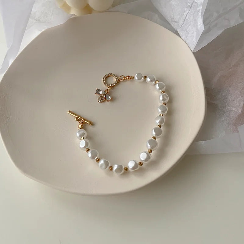 Lustrous Pearl & Diamond Charm Bracelet - GlamoROZ